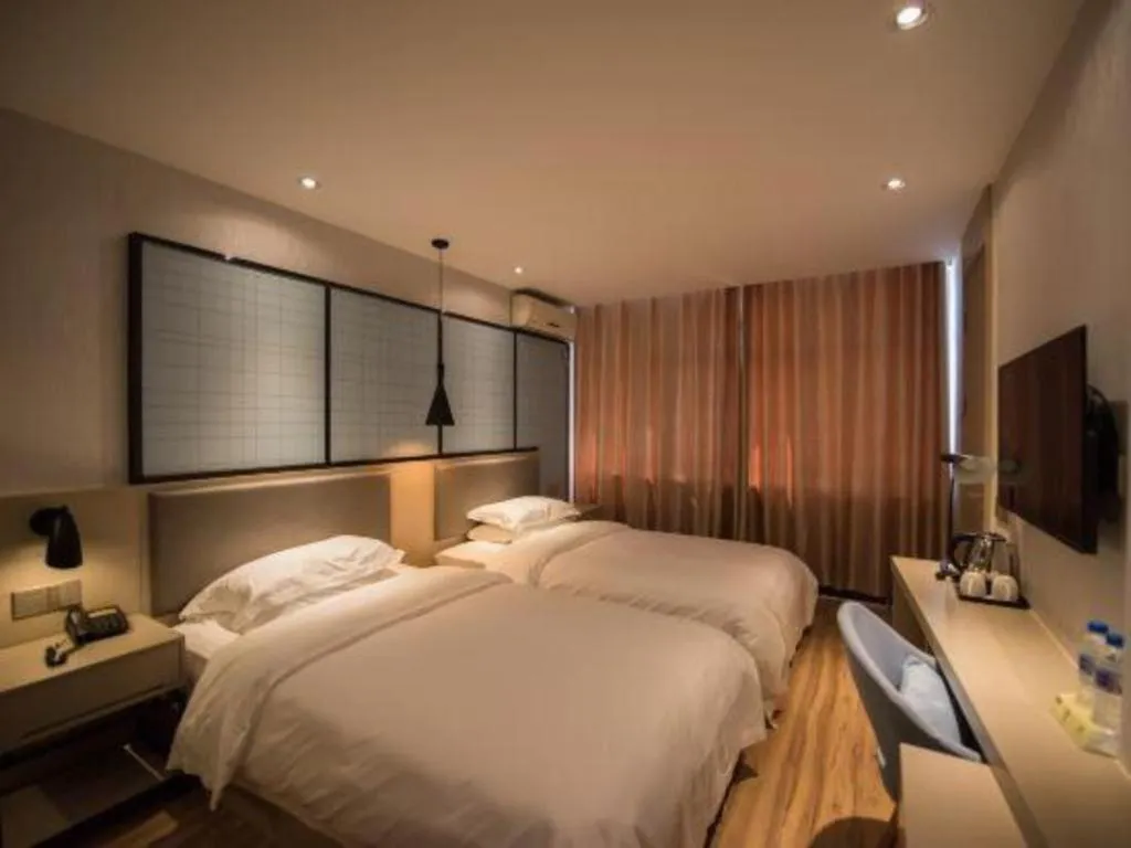 Bed in Borrman Hotel Hefei Guogou Plaza Sanli'an Metro Station