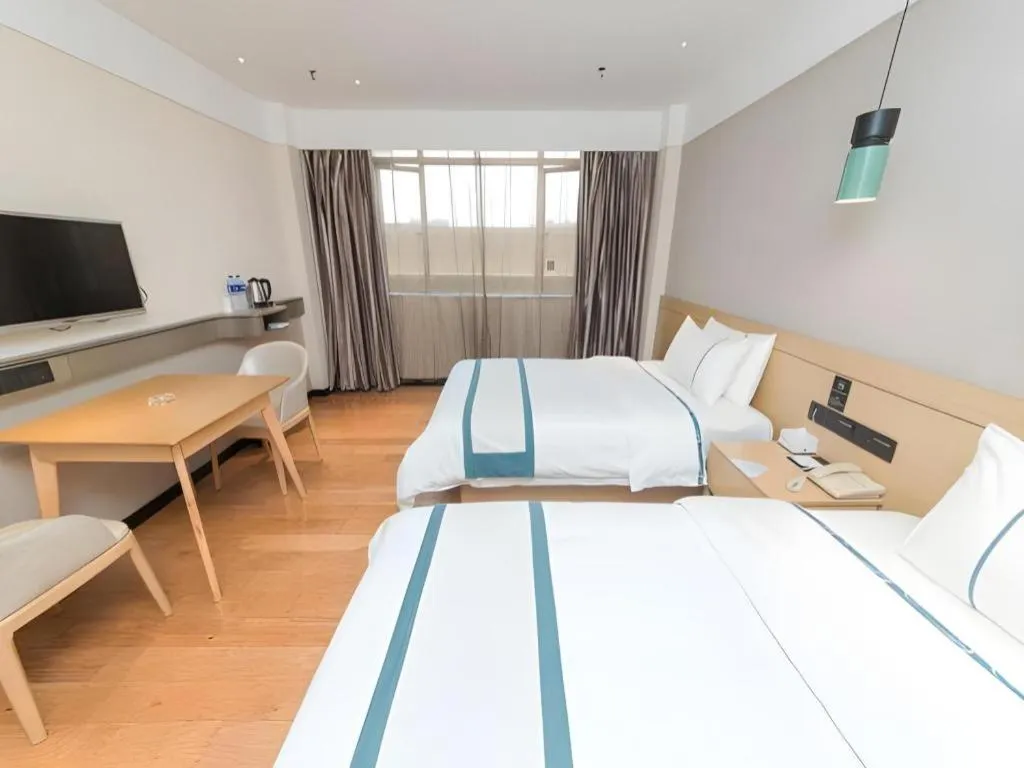 Bed in City Comfort Inn Guangzhou Panyu Qiaonan Aoyuan Plaza