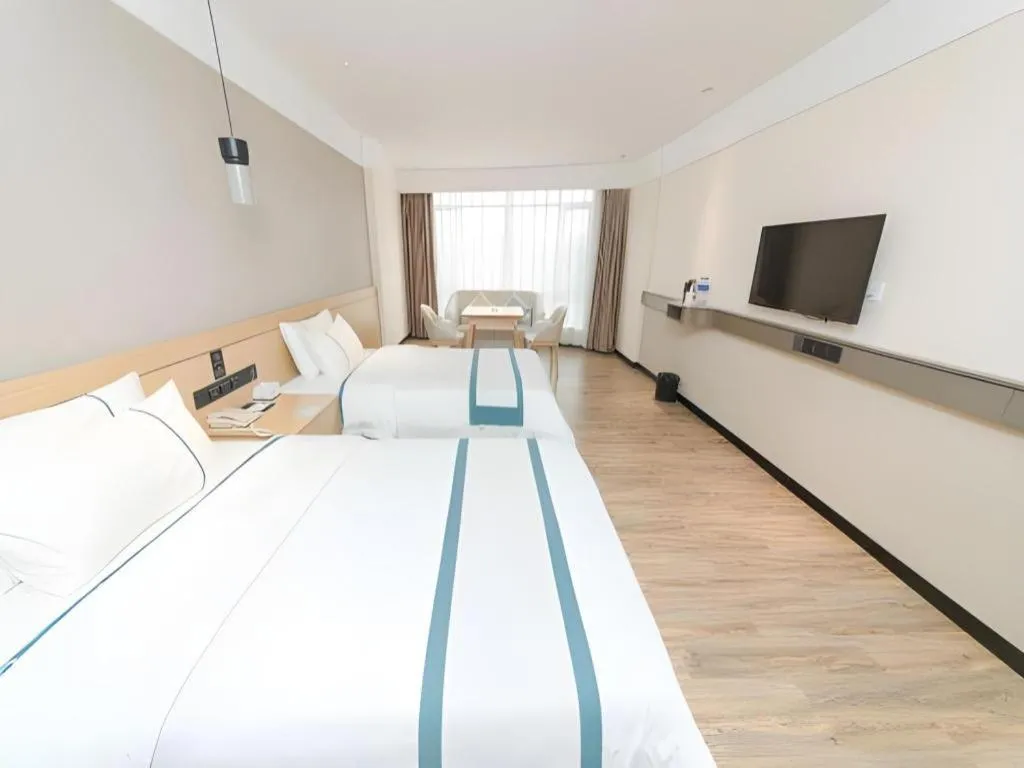 Bed in City Comfort Inn Guangzhou Panyu Qiaonan Aoyuan Plaza