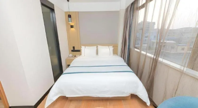 Bed in City Comfort Inn Guangzhou Panyu Qiaonan Aoyuan Plaza