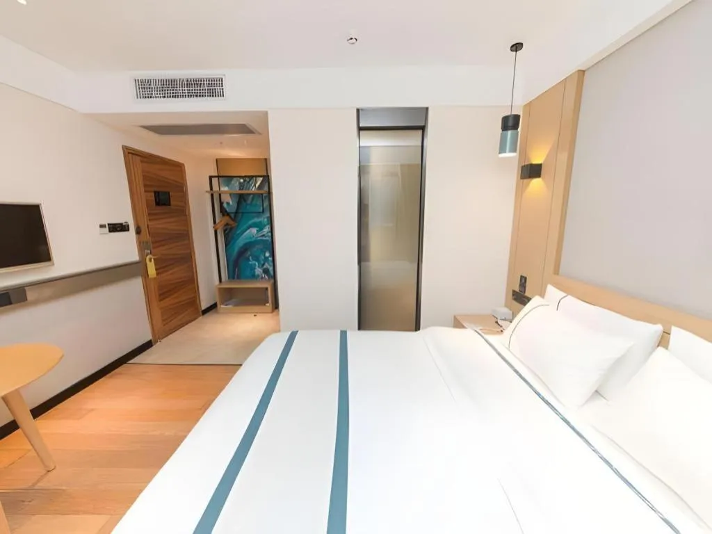 Bed in City Comfort Inn Guangzhou Panyu Qiaonan Aoyuan Plaza