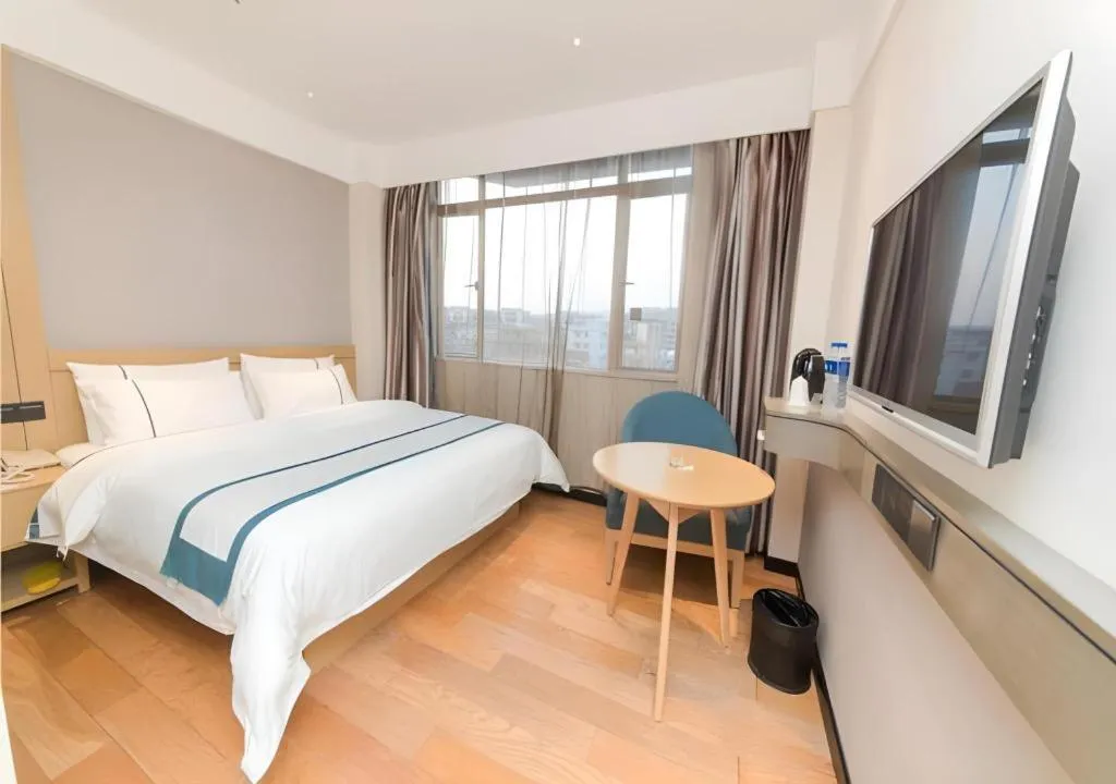 Bed in City Comfort Inn Guangzhou Panyu Qiaonan Aoyuan Plaza