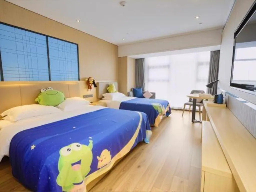 Bed in Echarm Hotel Aegean Shopping Park Zhonghuan Plaza