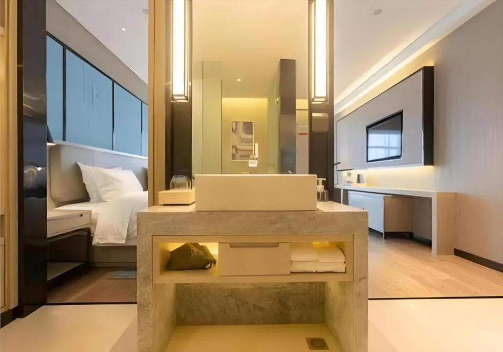 Bed in Echarm Hotel Aegean Shopping Park Zhonghuan Plaza