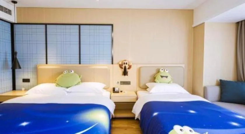 Bed in Echarm Hotel Aegean Shopping Park Zhonghuan Plaza