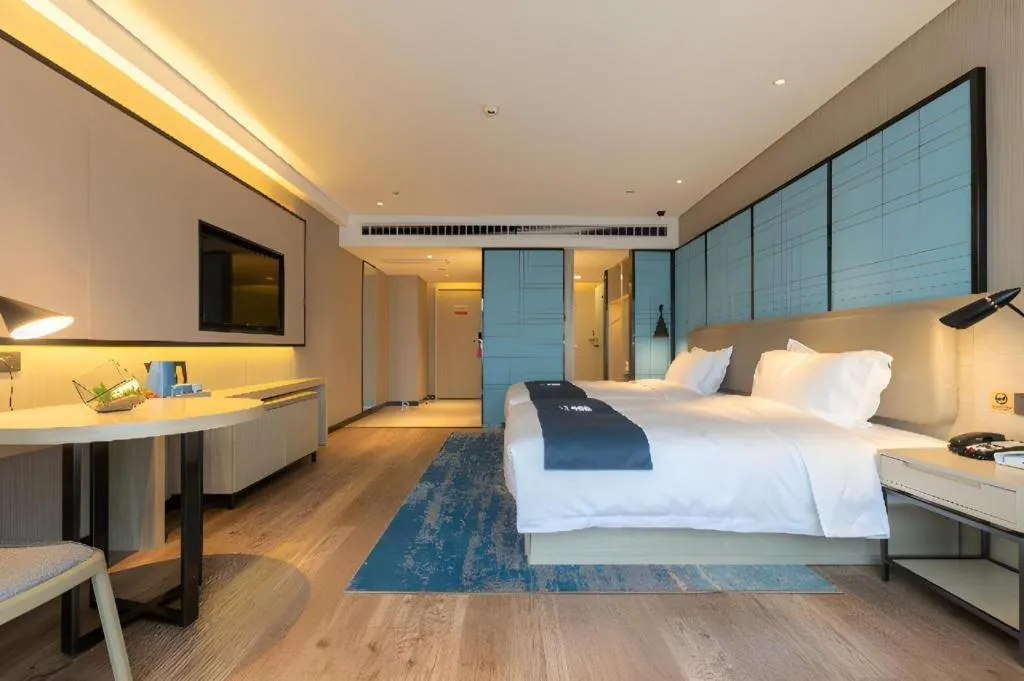 Bed in Echarm Hotel Aegean Shopping Park Zhonghuan Plaza