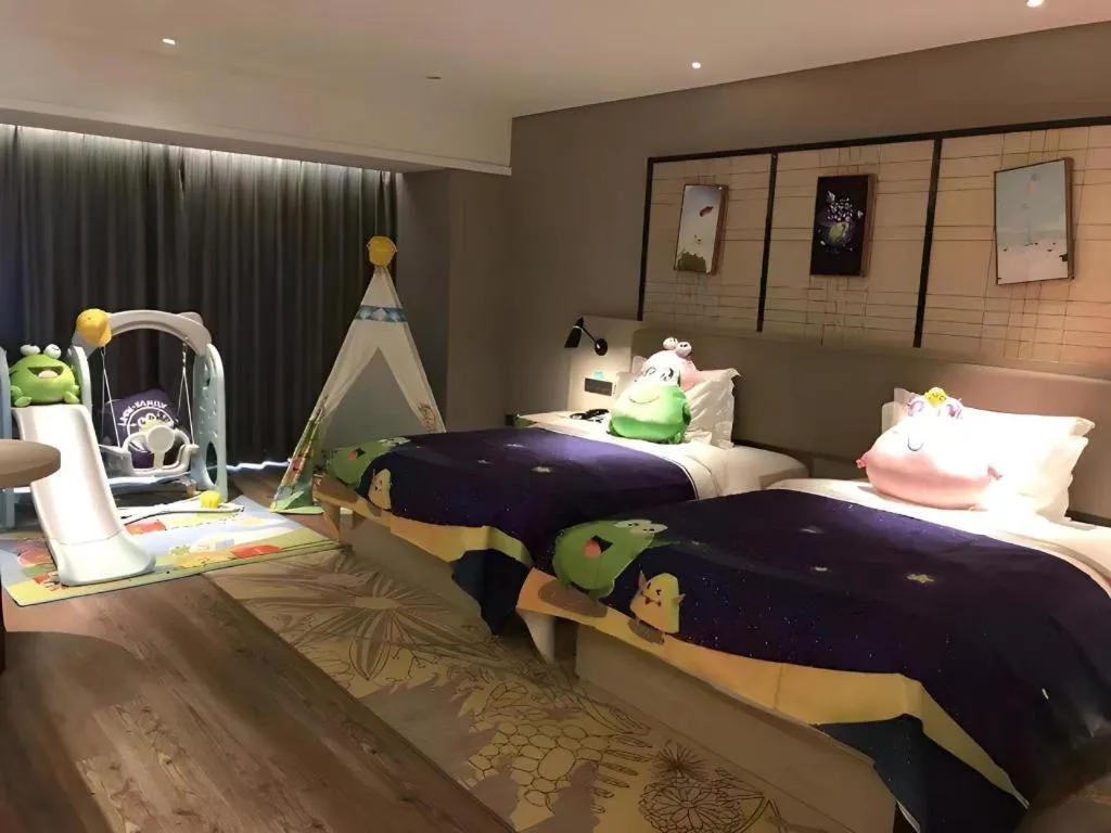 Bed in Echarm Hotel Aegean Shopping Park Zhonghuan Plaza