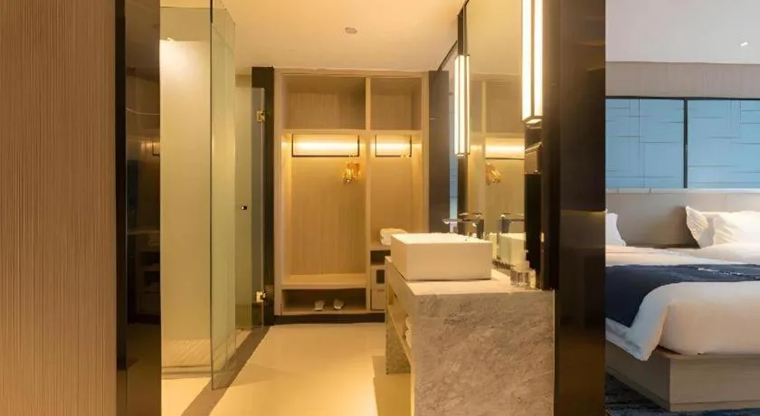 Bed in Echarm Hotel Aegean Shopping Park Zhonghuan Plaza