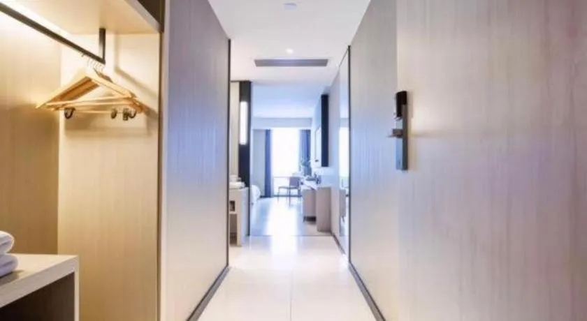 Bed in Echarm Hotel Aegean Shopping Park Zhonghuan Plaza