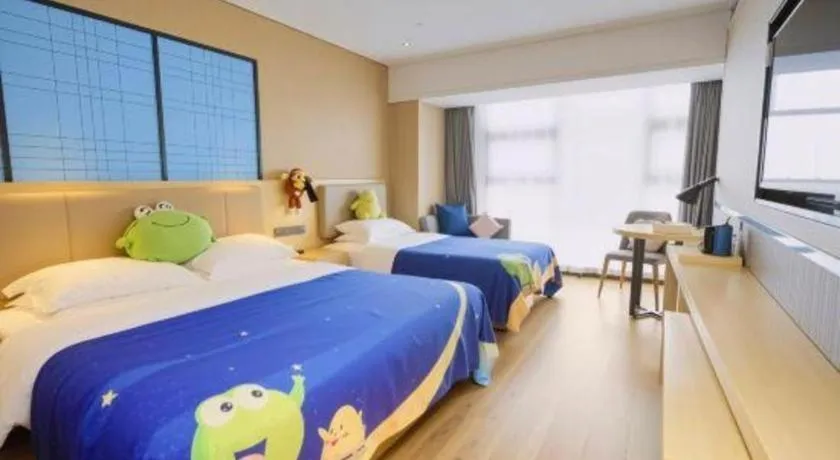 Bed in Echarm Hotel Aegean Shopping Park Zhonghuan Plaza