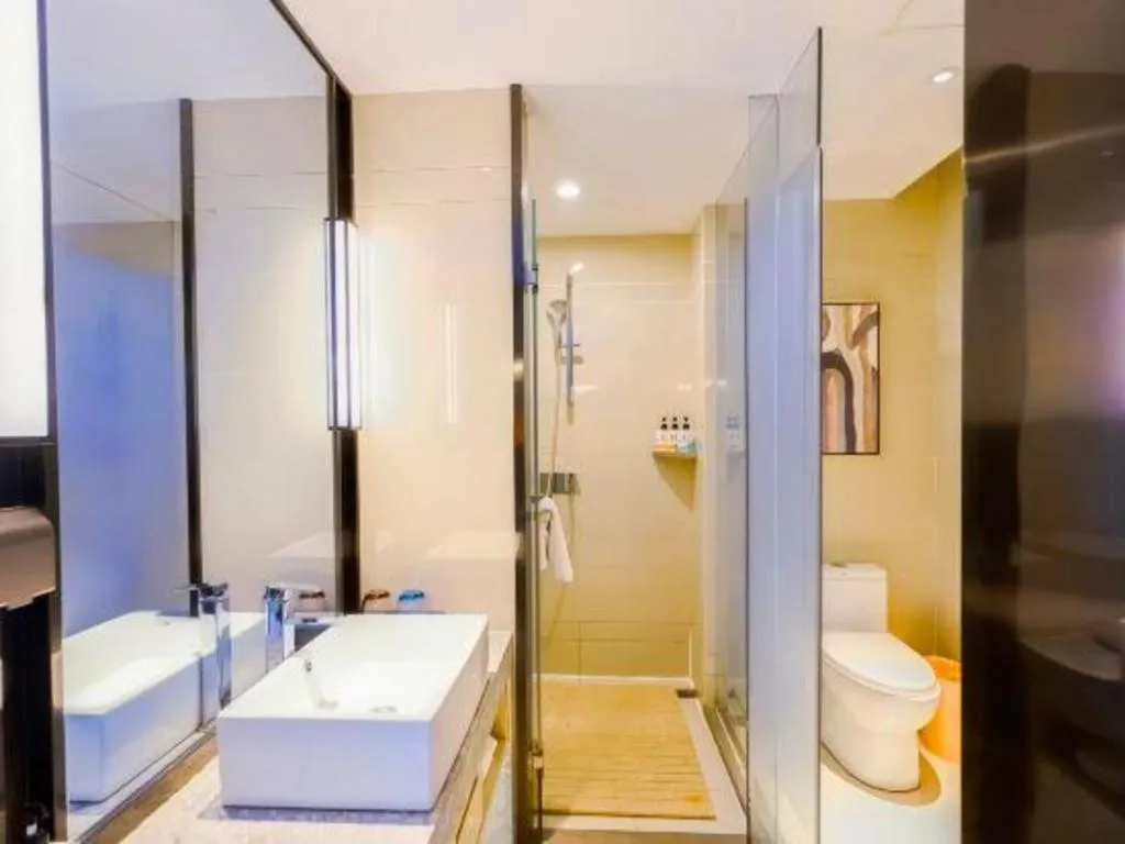 Bed in Echarm Hotel Aegean Shopping Park Zhonghuan Plaza