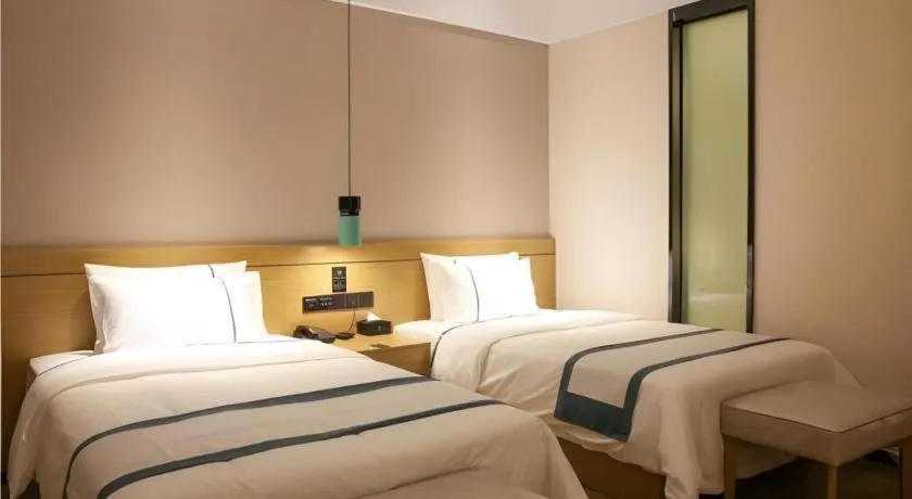 Bed in City Comfort Inn Wuhan Ikea