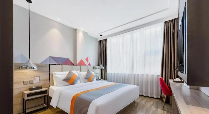 Bed in Borrman Hotel Tai'an Central Hospital Taishan Tianwai Village Hongmen