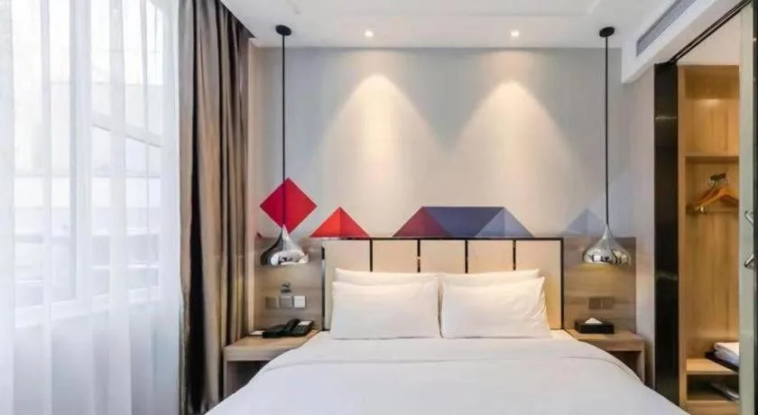 Bed in Borrman Hotel Tai'an Central Hospital Taishan Tianwai Village Hongmen