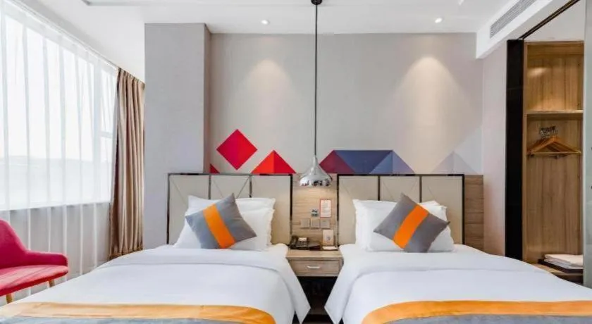 Bed in Borrman Hotel Tai'an Central Hospital Taishan Tianwai Village Hongmen