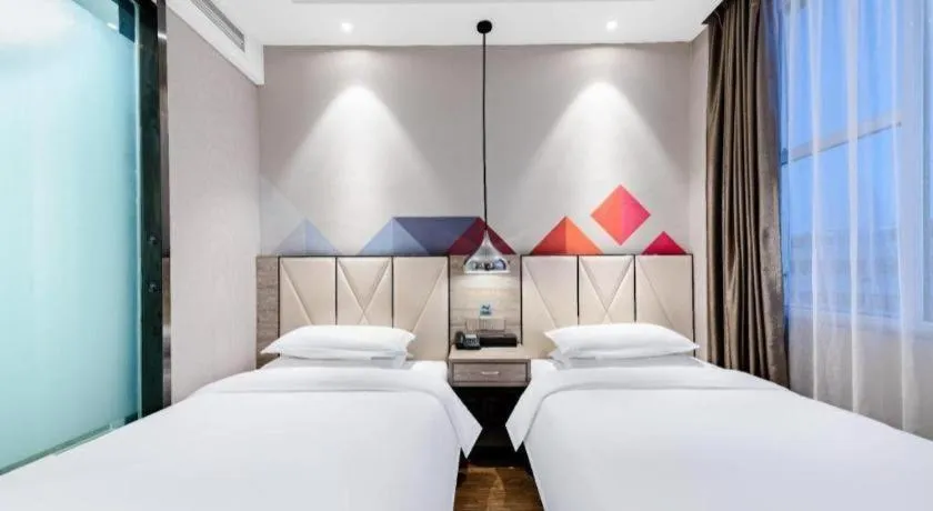 Bed in Borrman Hotel Tai'an Central Hospital Taishan Tianwai Village Hongmen