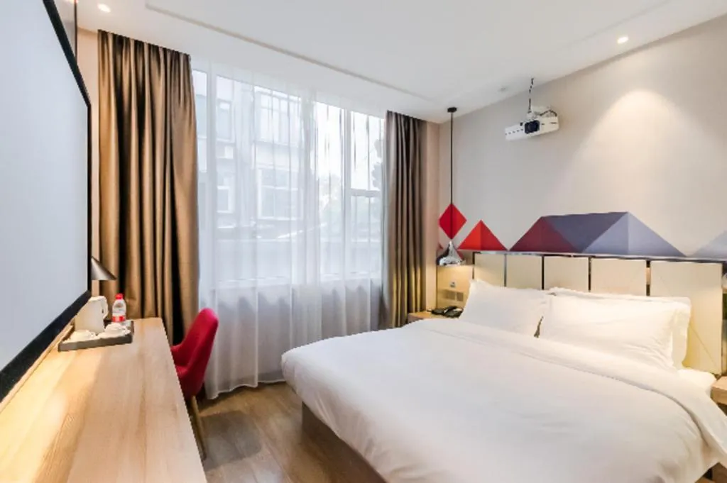 Bed in Borrman Hotel Tai'an Central Hospital Taishan Tianwai Village Hongmen