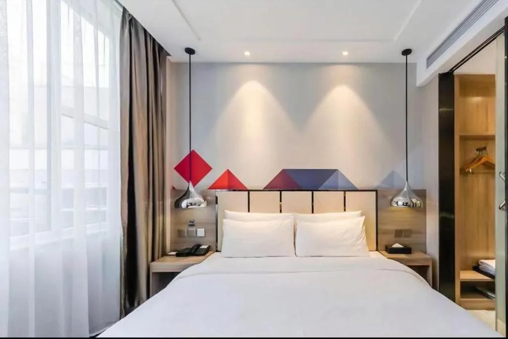 Bed in Borrman Hotel Tai'an Central Hospital Taishan Tianwai Village Hongmen