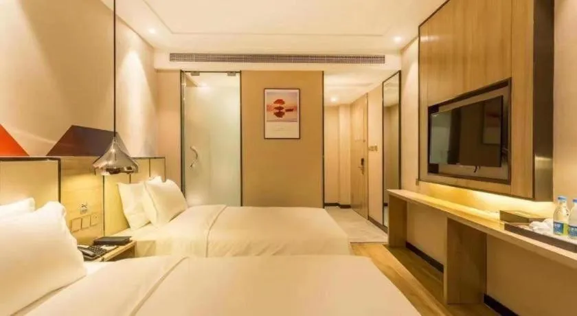 Bed in Borrman Hotel Tai'an Central Hospital Taishan Tianwai Village Hongmen