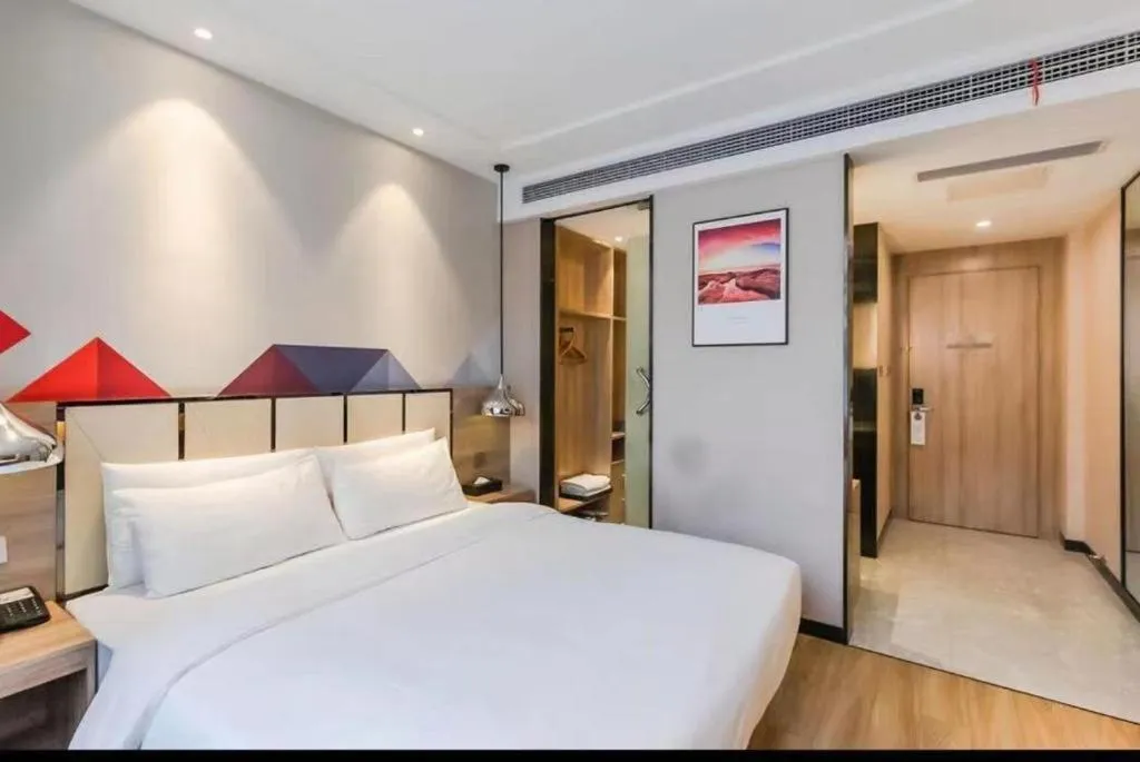 Bed in Borrman Hotel Tai'an Central Hospital Taishan Tianwai Village Hongmen