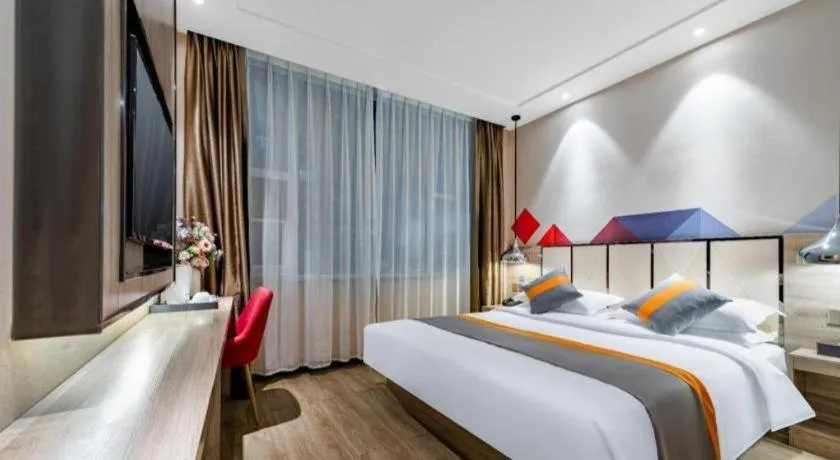 Bed in Borrman Hotel Tai'an Central Hospital Taishan Tianwai Village Hongmen