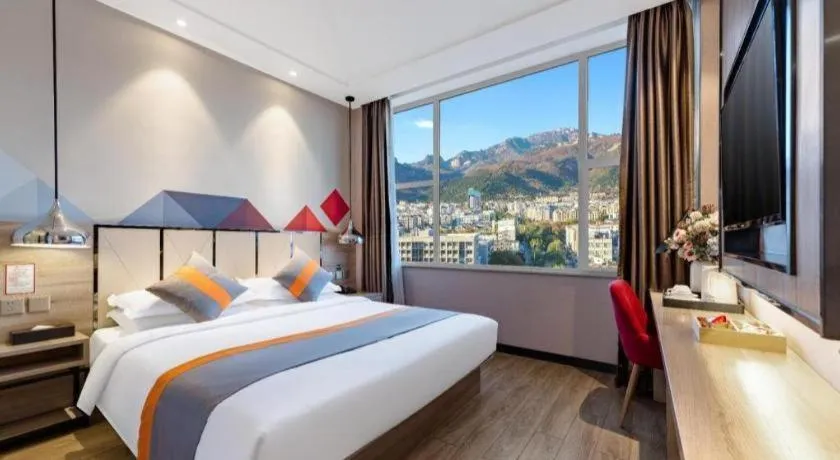 Bed in Borrman Hotel Tai'an Central Hospital Taishan Tianwai Village Hongmen