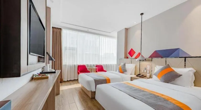 Bed in Borrman Hotel Tai'an Central Hospital Taishan Tianwai Village Hongmen