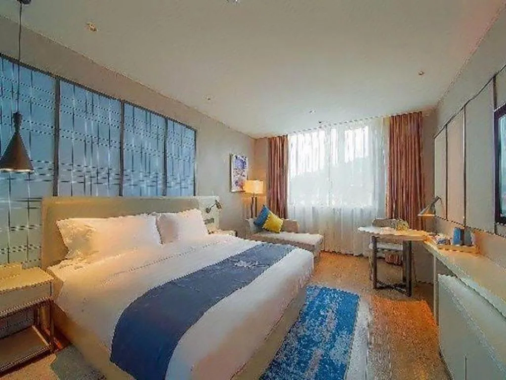 Bed in Echarm Hotel Guangzhou Changlong Shiqiao Metro Station