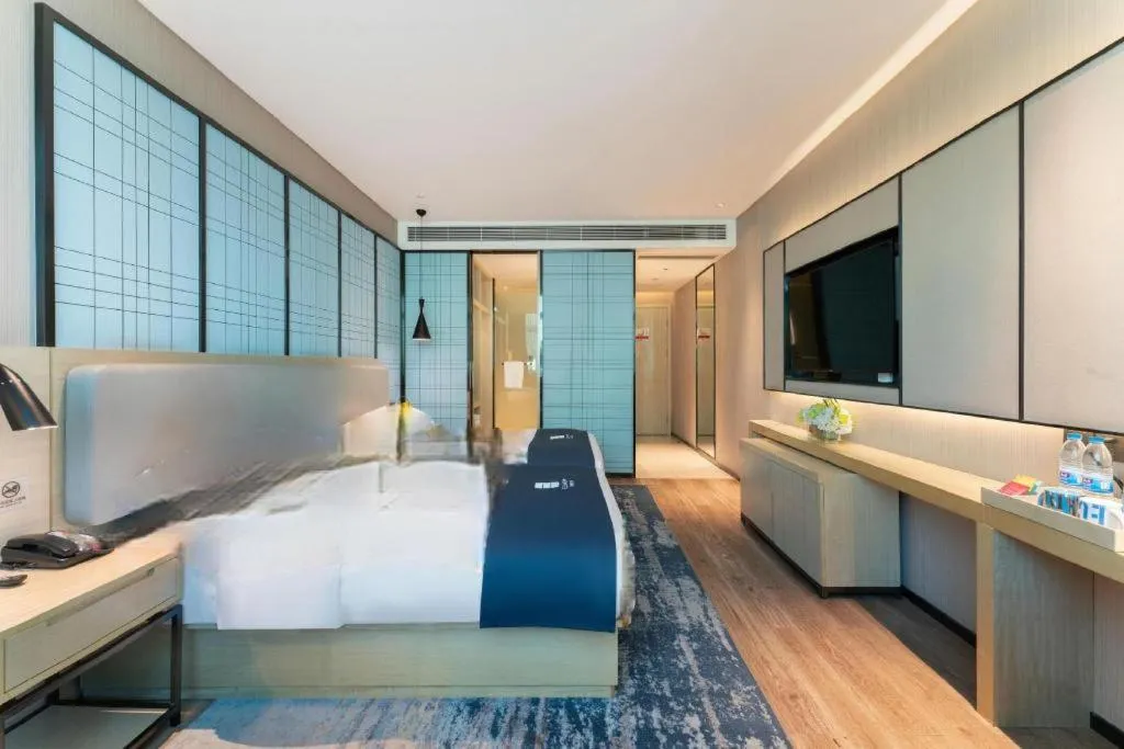 Bed in Echarm Hotel Guangzhou Changlong Shiqiao Metro Station