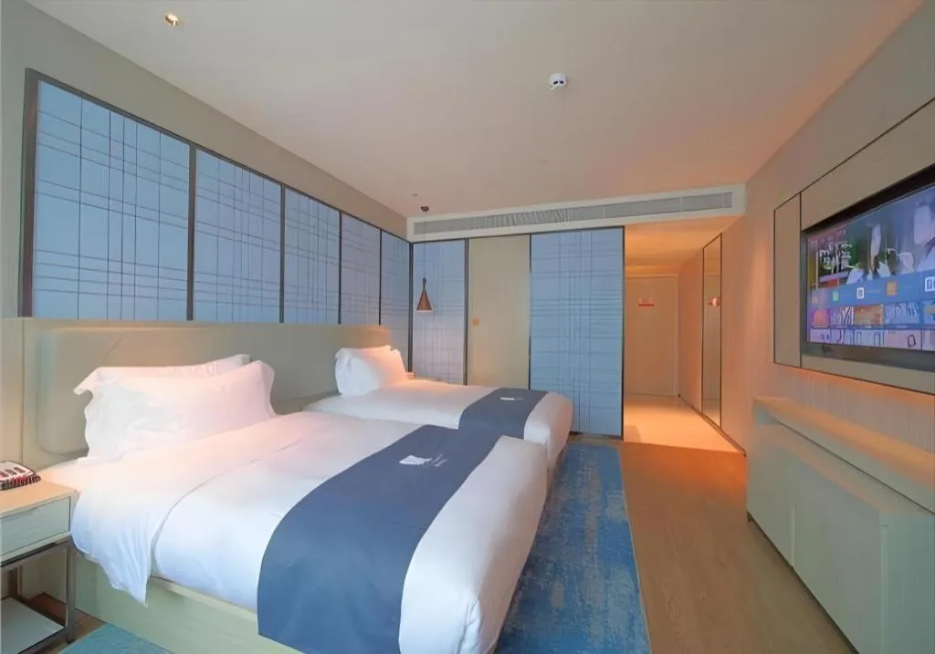 Bed in Echarm Hotel Guangzhou Changlong Shiqiao Metro Station
