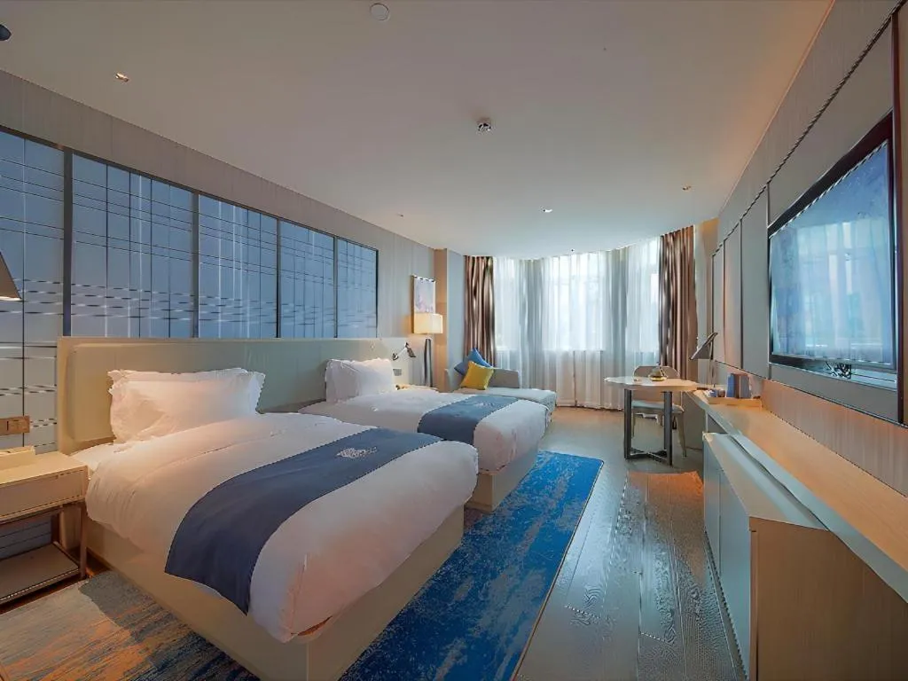 Bed in Echarm Hotel Guangzhou Changlong Shiqiao Metro Station