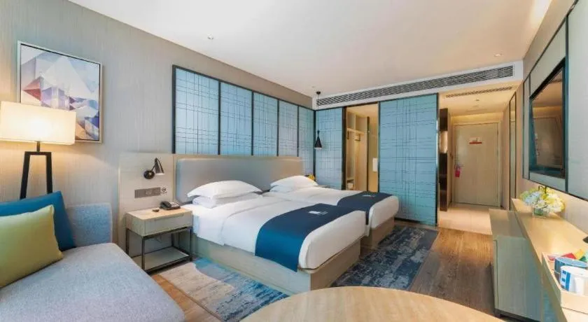 Bed in Echarm Hotel Guangzhou Changlong Shiqiao Metro Station
