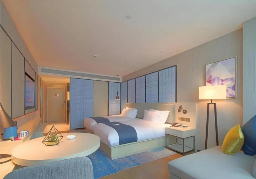 Bed in Echarm Hotel Guangzhou Changlong Shiqiao Metro Station