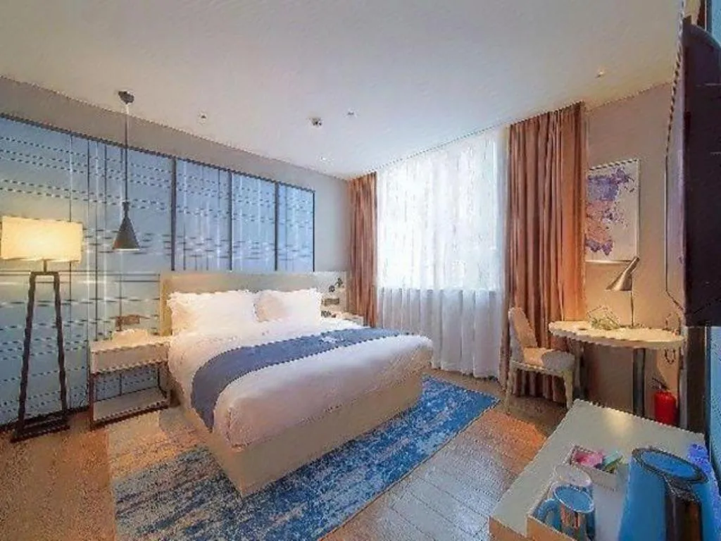 Bed in Echarm Hotel Guangzhou Changlong Shiqiao Metro Station