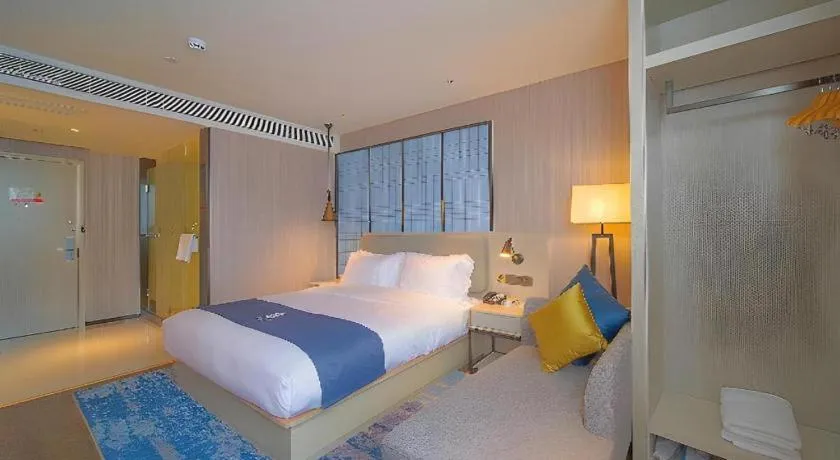 Bed in Echarm Hotel Guangzhou Changlong Shiqiao Metro Station