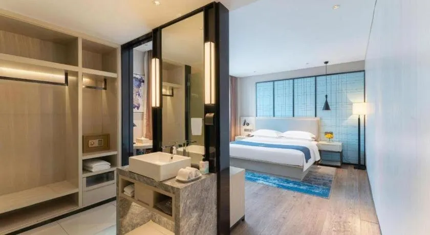 Bed in Echarm Hotel Guangzhou Changlong Shiqiao Metro Station