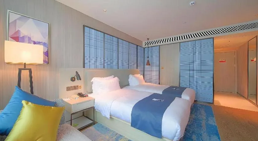Bed in Echarm Hotel Guangzhou Changlong Shiqiao Metro Station