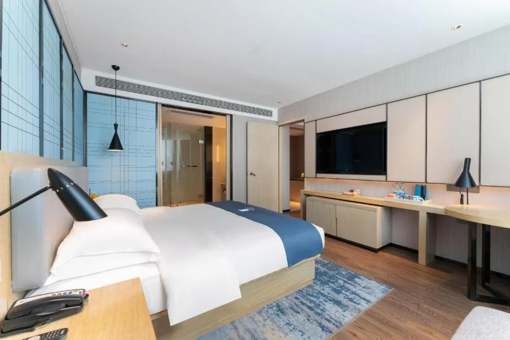 Bed in Echarm Hotel Guangzhou Changlong Shiqiao Metro Station