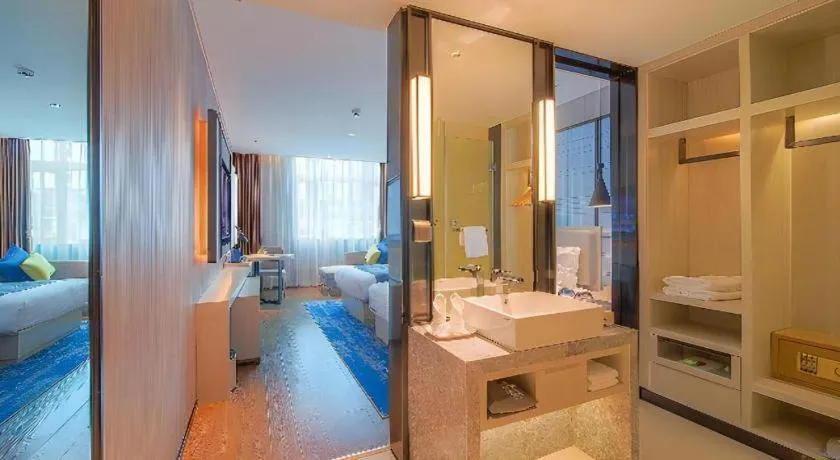 Bed in Echarm Hotel Guangzhou Changlong Shiqiao Metro Station