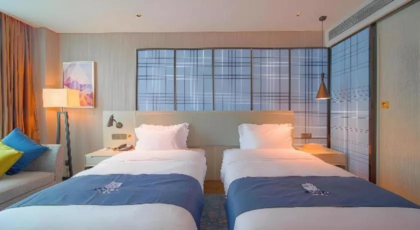 Bed in Echarm Hotel Guangzhou Changlong Shiqiao Metro Station