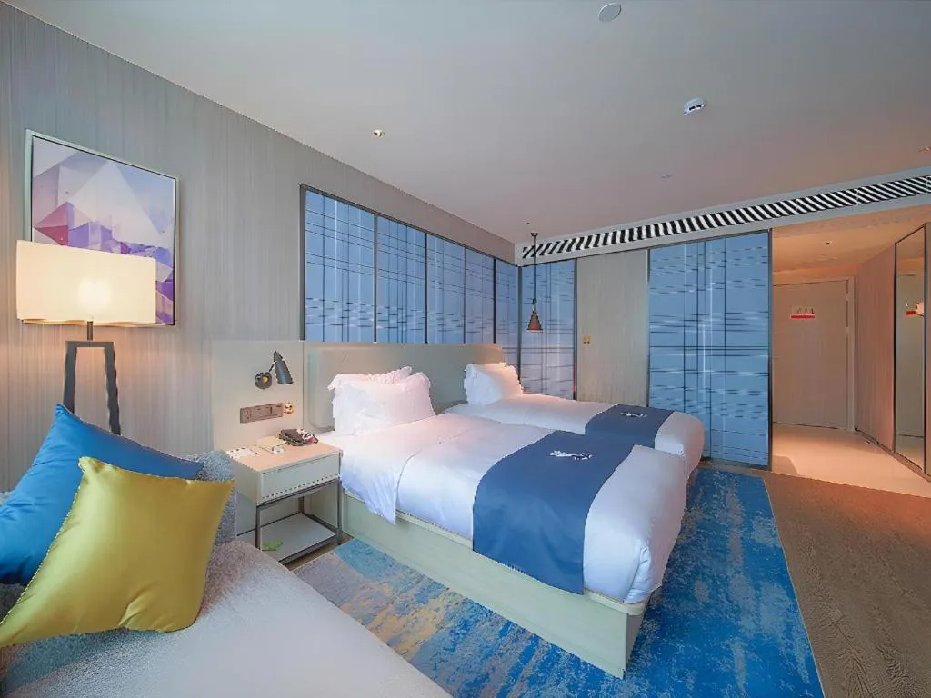 Bed in Echarm Hotel Guangzhou Changlong Shiqiao Metro Station