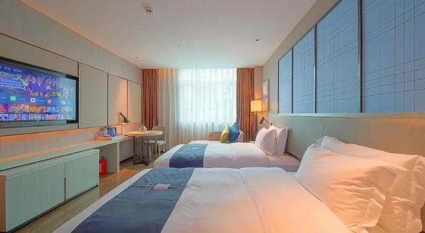 Bed in Echarm Hotel Guangzhou Changlong Shiqiao Metro Station