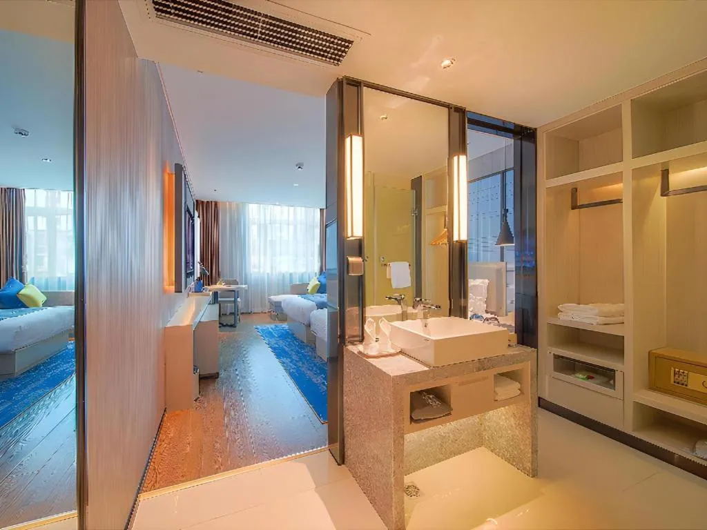 Bed in Echarm Hotel Guangzhou Changlong Shiqiao Metro Station