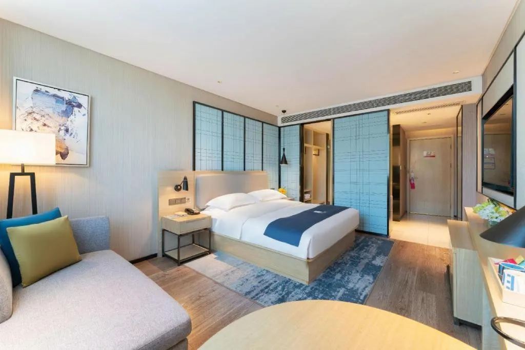 Bed in Echarm Hotel Guangzhou Changlong Shiqiao Metro Station