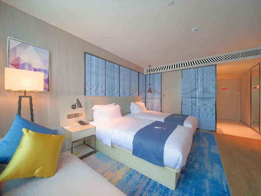 Bed in Echarm Hotel Guangzhou Changlong Shiqiao Metro Station