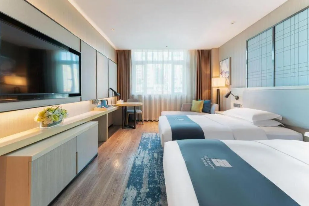 Bed in Echarm Hotel Guangzhou Changlong Shiqiao Metro Station