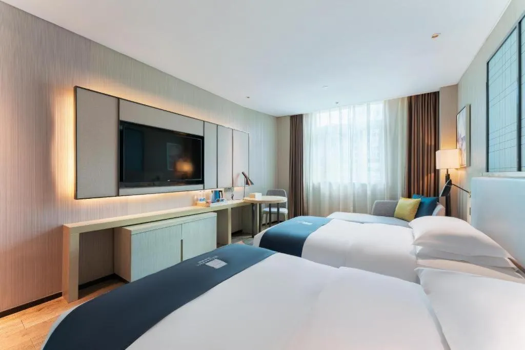 Bed in Echarm Hotel Guangzhou Changlong Shiqiao Metro Station