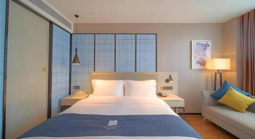 Bed in Echarm Hotel Guangzhou Changlong Shiqiao Metro Station