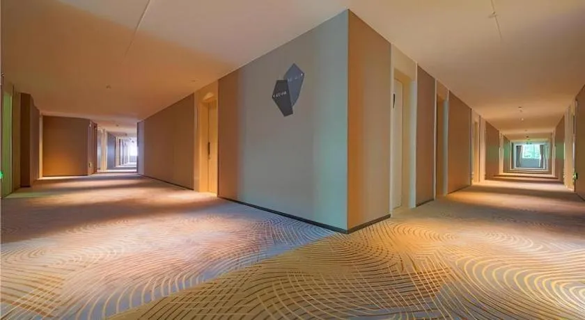 Bed in Echarm Hotel Guangzhou Changlong Shiqiao Metro Station