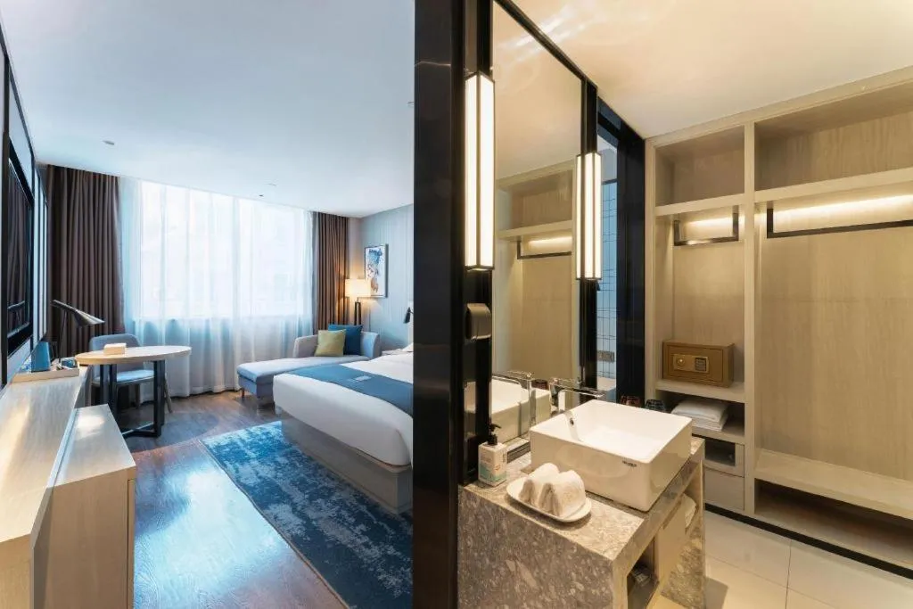 Bed in Echarm Hotel Guangzhou Changlong Shiqiao Metro Station